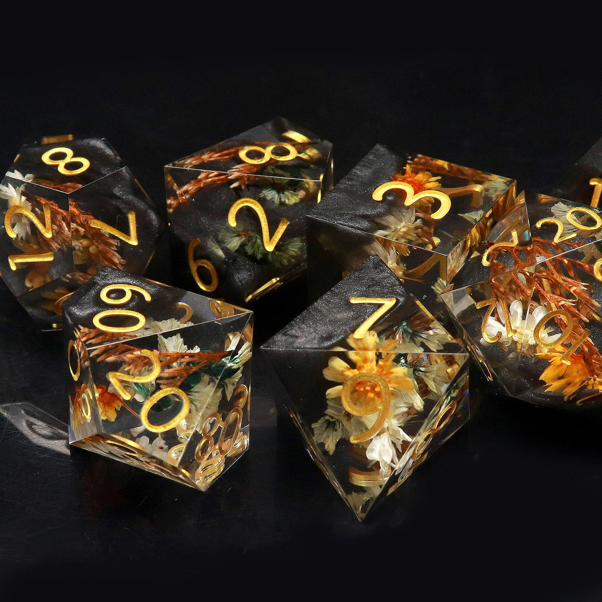 Haxtec resin dice, epoxy floral design catching light with every roll.