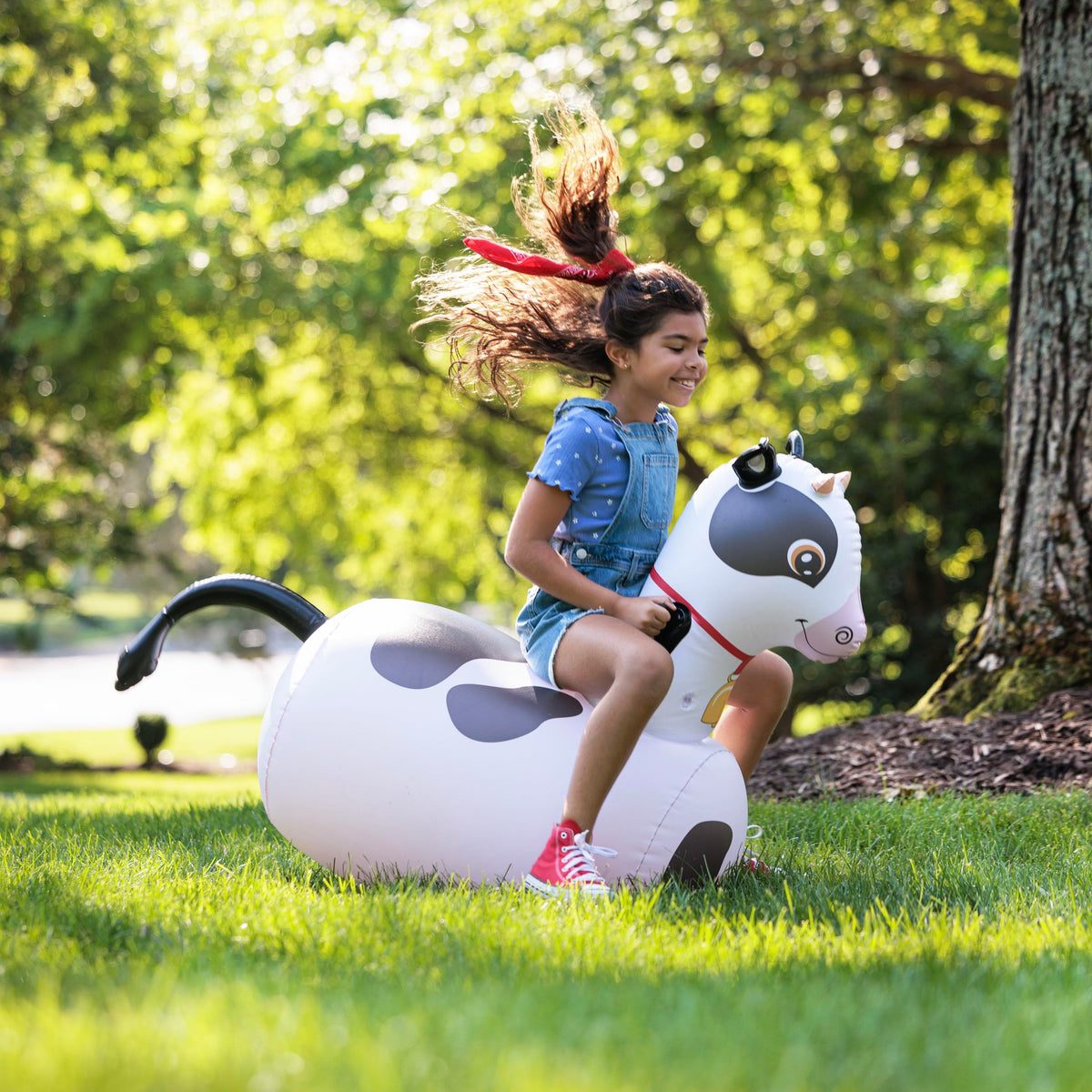 HearthSong Hop N Go cow back view showing large ride surface for kids.