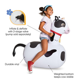 HearthSong Hop N Go cow action image with jumping fun outdoors.