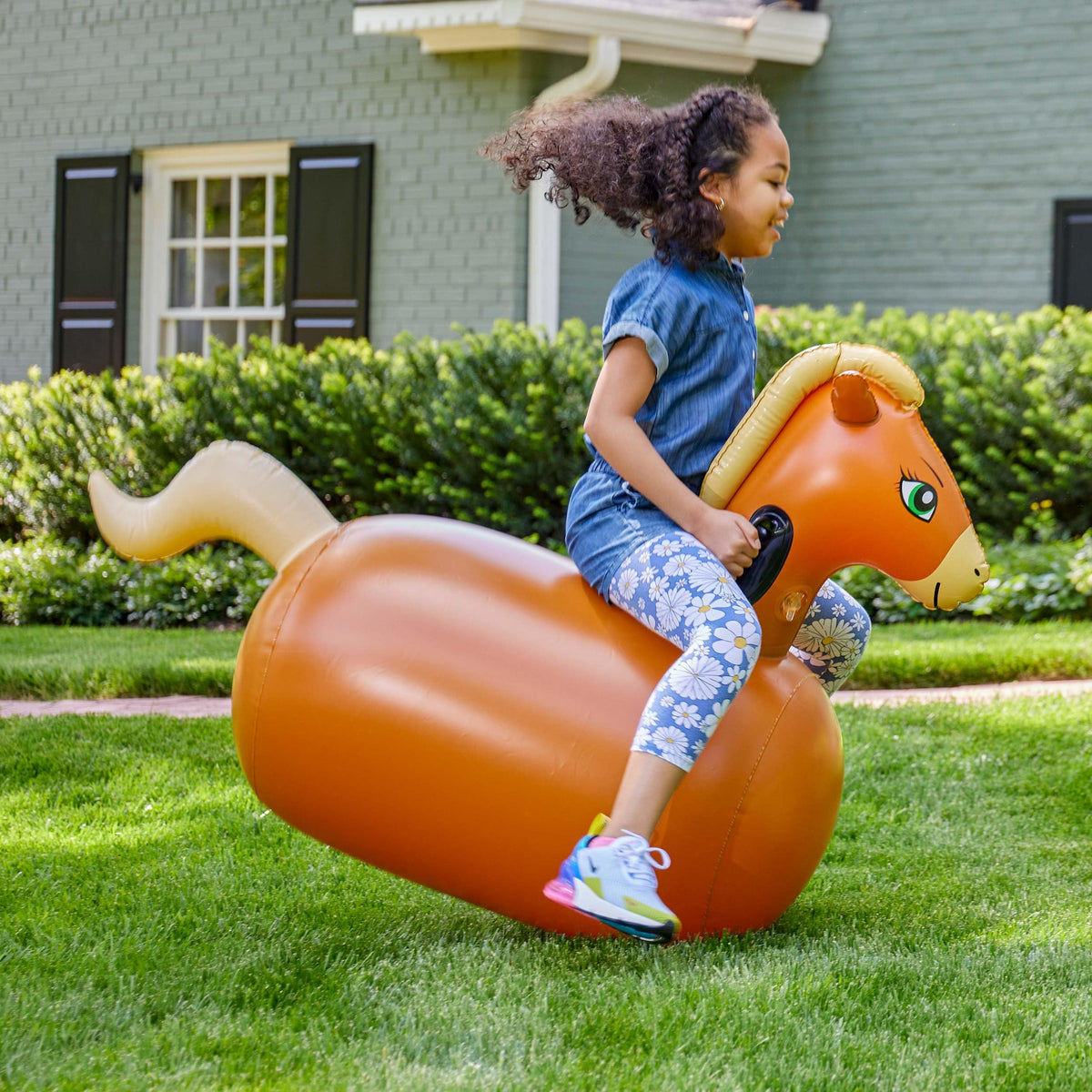 HearthSong Hop N Go inflatable horse, close-up vinyl, showing sturdy construction and safety handles.