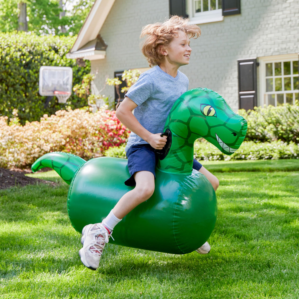 HearthSong Hop N Go kid enjoying outdoor play with friends.