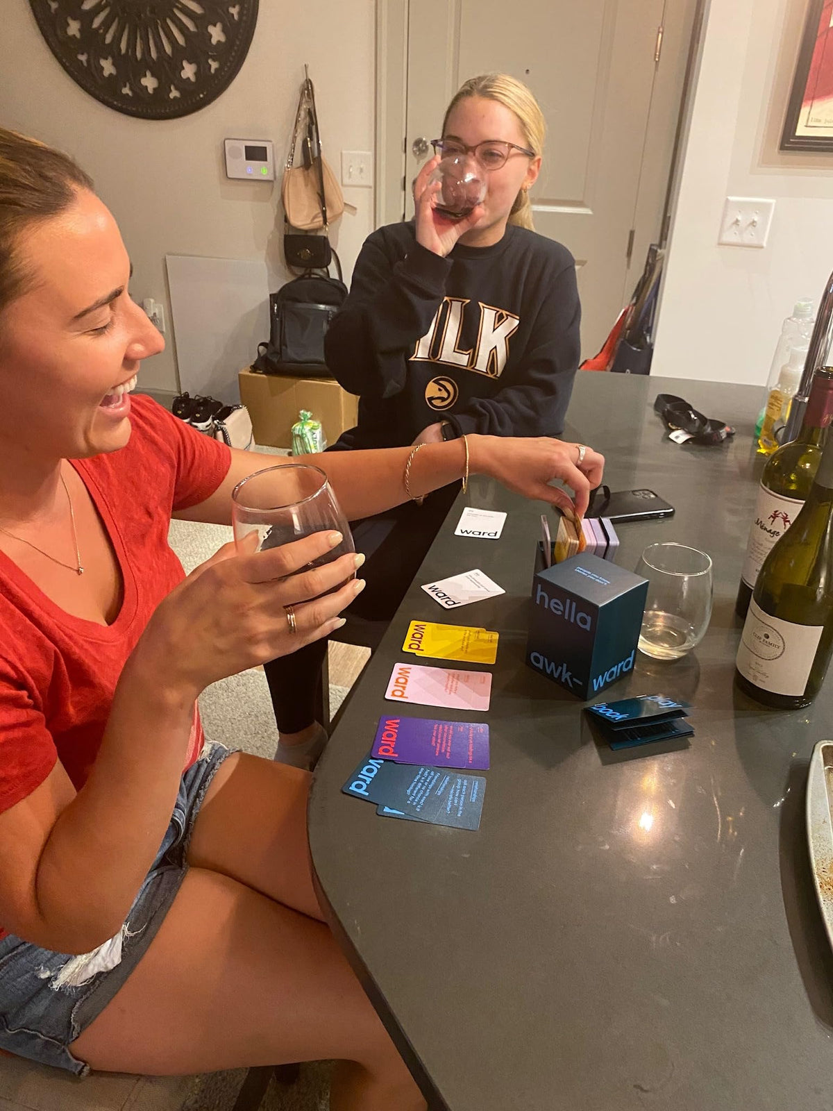 Hella Awkward game night table scene inviting group laughter and discussion