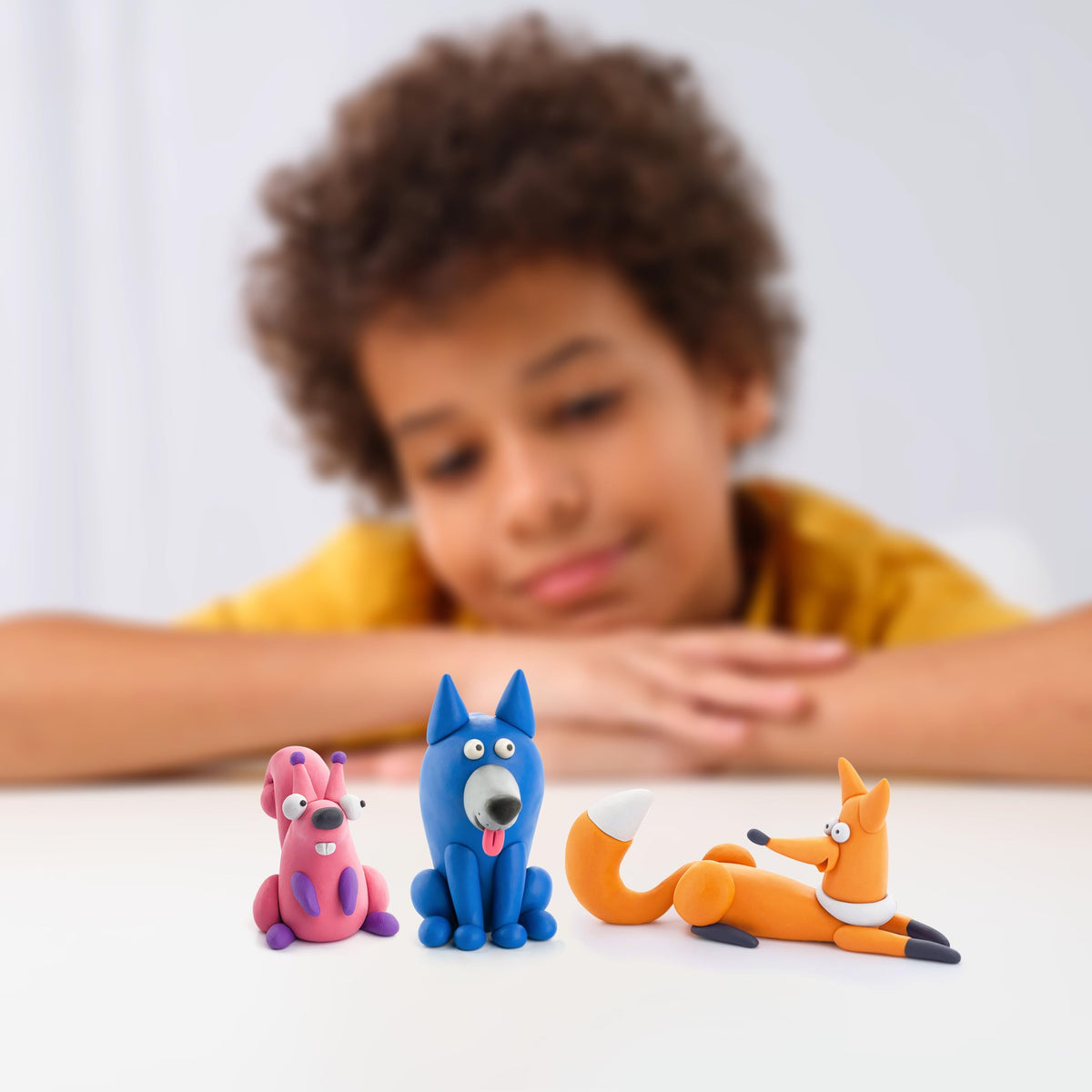 HEY CLAY storage tins keep colors organized after play sessions