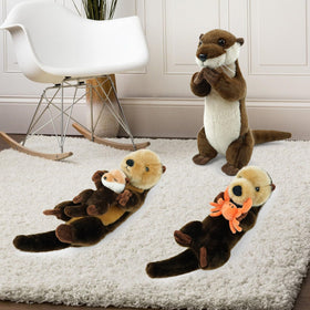 Hideekoog Sea Otter plush holding crab for interactive play.