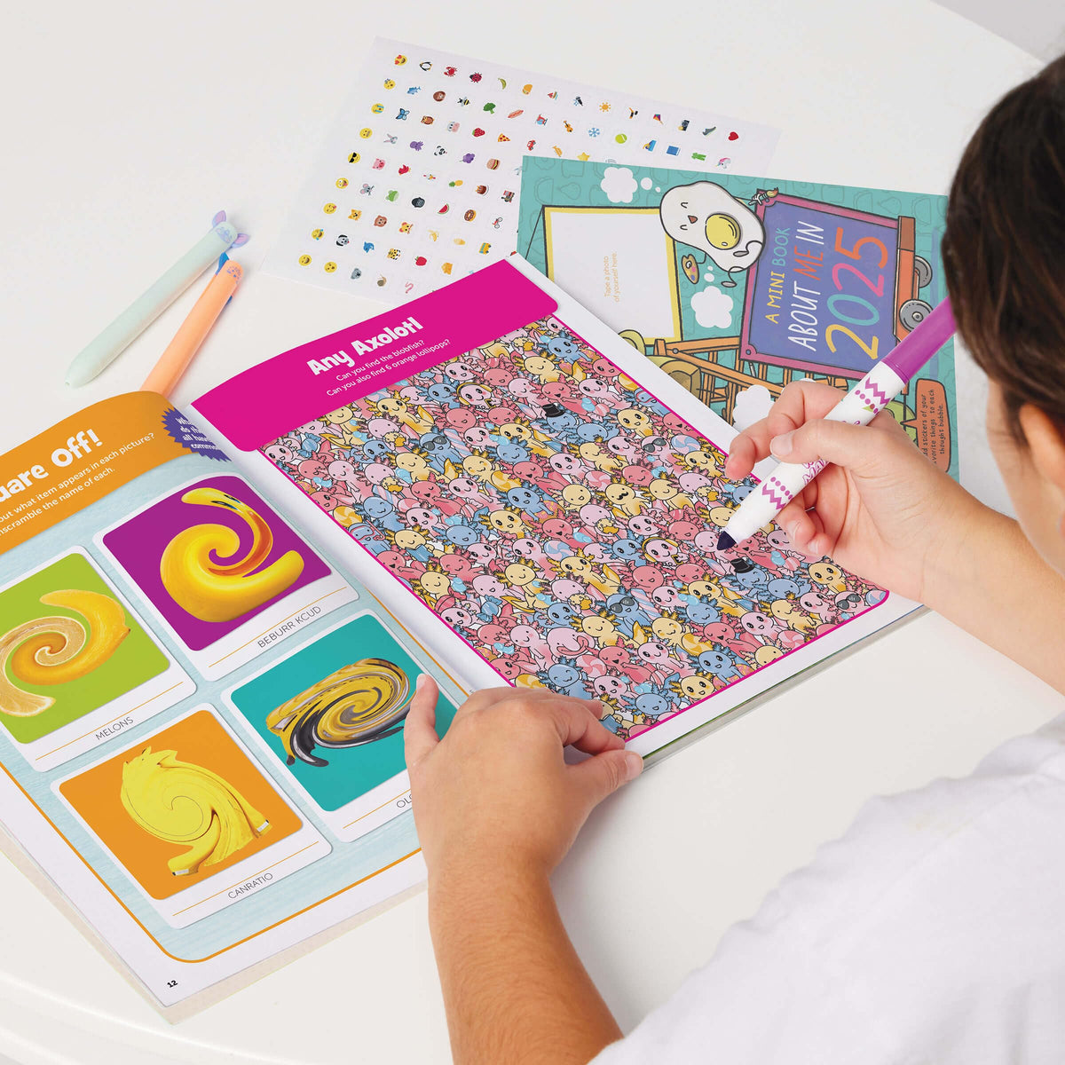 Highlights Puzzle Fun 2025 travel-friendly-format shows a compact, portable set for trips