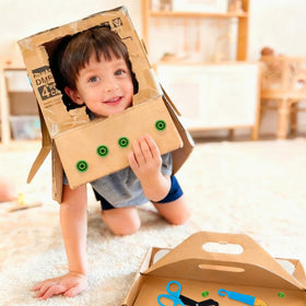 HIKISS measuring and cutting activity builds spatial awareness during play.