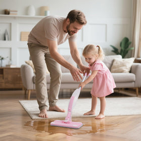 Hilsoeet Kids Spray Mop Pink in action on floor surfaces.