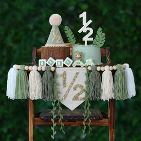 HODIHIWI half year banner on a high chair for photos