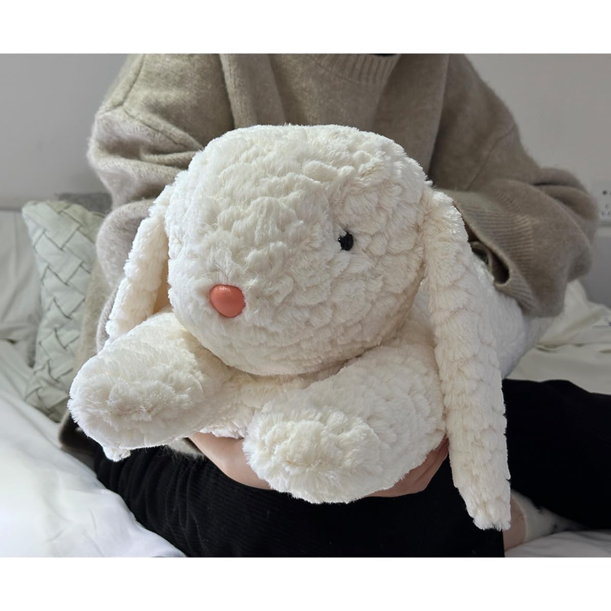 Hofun4U rabbit plush pillow 47-inch full-length on bed or sofa.