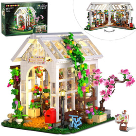 HOGOKIDS Flower House Building Set with LED light lights a cozy night display.
