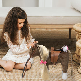 HollyHOME horse plush with realistic saddle invites pretend riding adventures