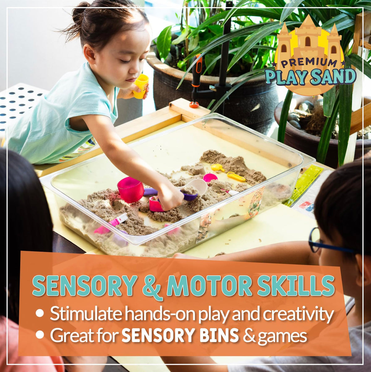 Indoor-outdoor setup with sand tray and toys for flexible play.