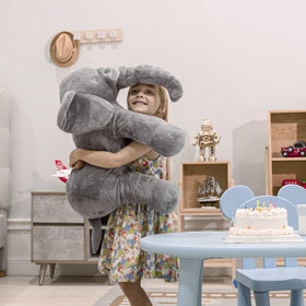 Homily 24-inch blue elephant side view, showcasing giant size for comfortable cuddling.