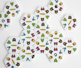 HoneyCombs drawstring pouch keeps tiles organized for on-the-go fun.