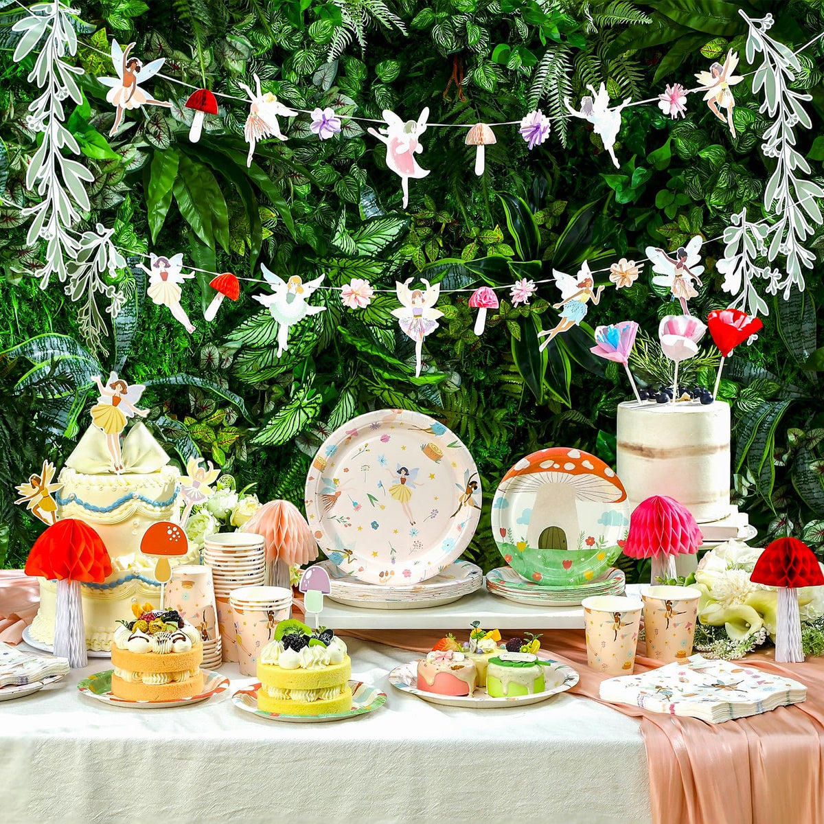 Honeydak cake decorations create a whimsical ballet fairy centerpiece.