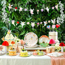 Honeydak cake decorations create a whimsical ballet fairy centerpiece.