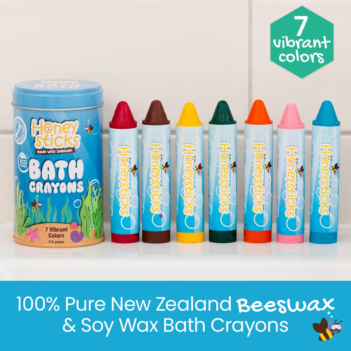 Child hands gripping Honeysticks bath crayon for easy drawing.