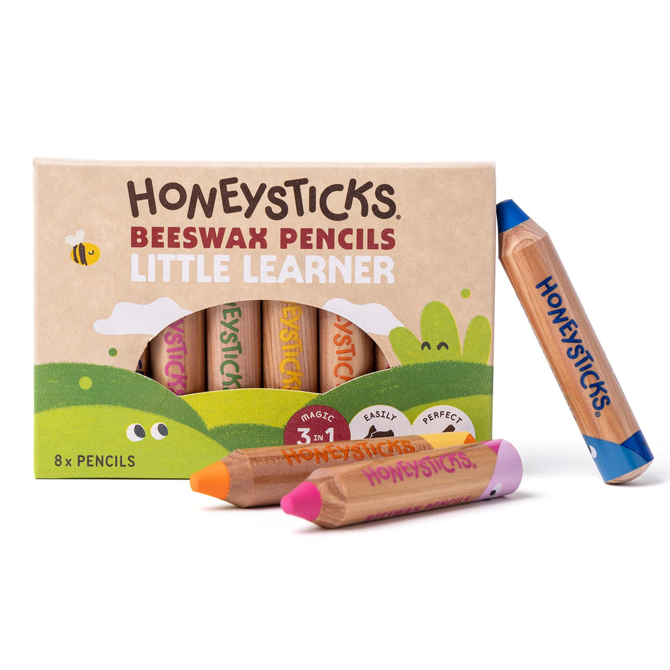 Honeysticks Little Learner jumbo pencil in hand, easy grasp for toddlers and creative play.