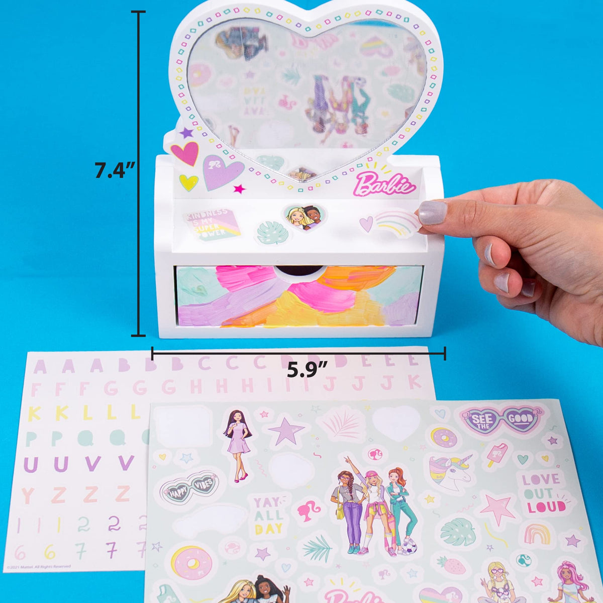 Barbie vanity mirror and lined drawer to store finished pieces.