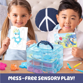 Bluey molds and colorful pebbles spark imaginative storytelling during sensory play.