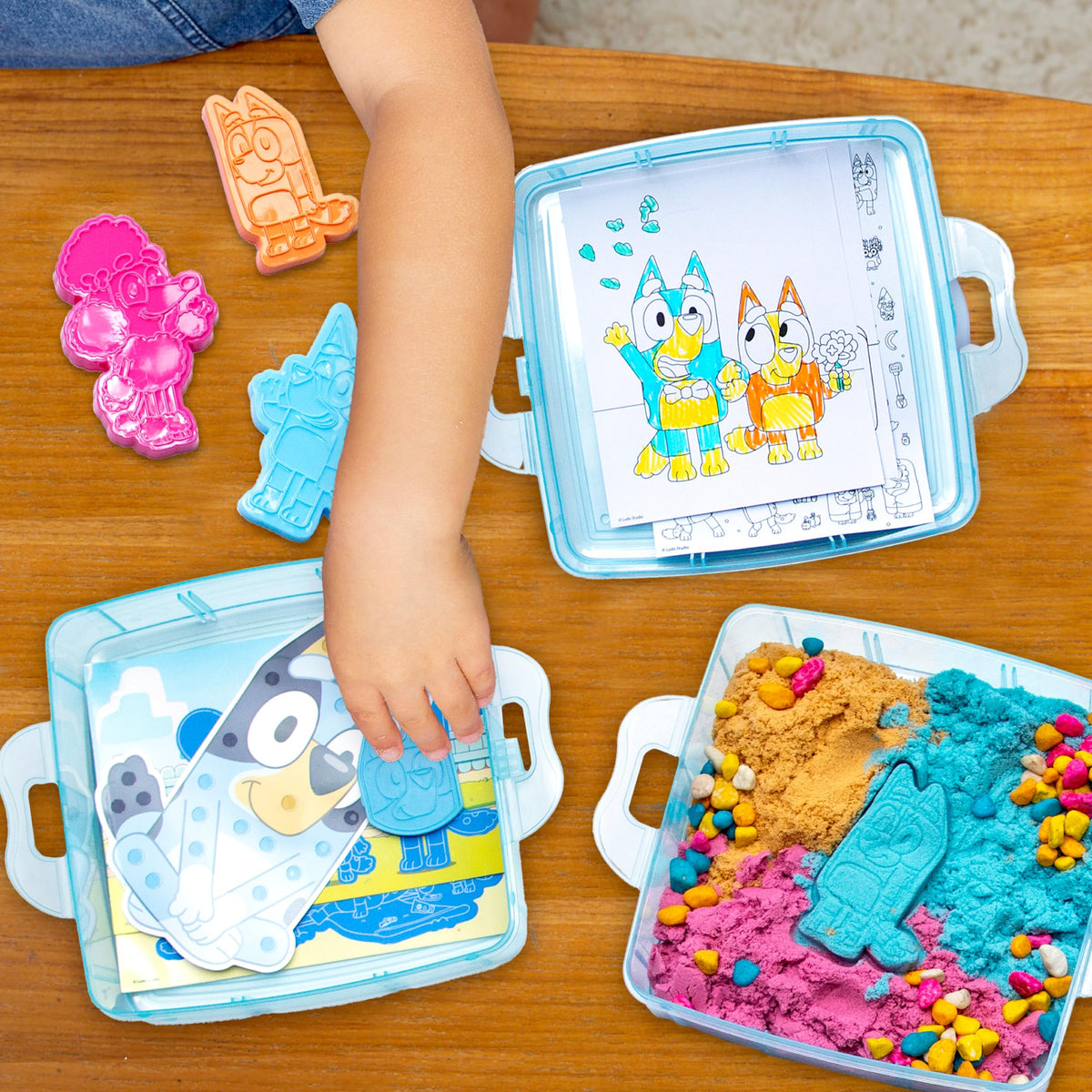 Bluey scratch coin activity reveals hidden designs during play.