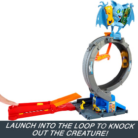Hot Wheels adjustable launcher directs action for varied stunts.