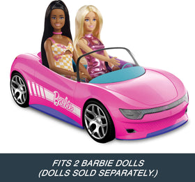 A child enjoys playtime with the Hot Wheels Barbie RC Convertible.