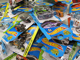 Hot Wheels packaging wear reflects real-world handling while protecting car interiors.