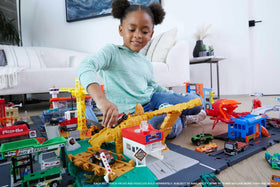 Hot Wheels City Downtown Car Park lift action elevates cars to parking levels.