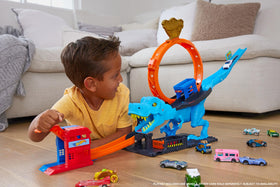 Hot Wheels City slam launcher powering a fast, exciting loop race