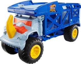 Drop-down ramp on Hot Wheels Monster Mover enables quick car launches.