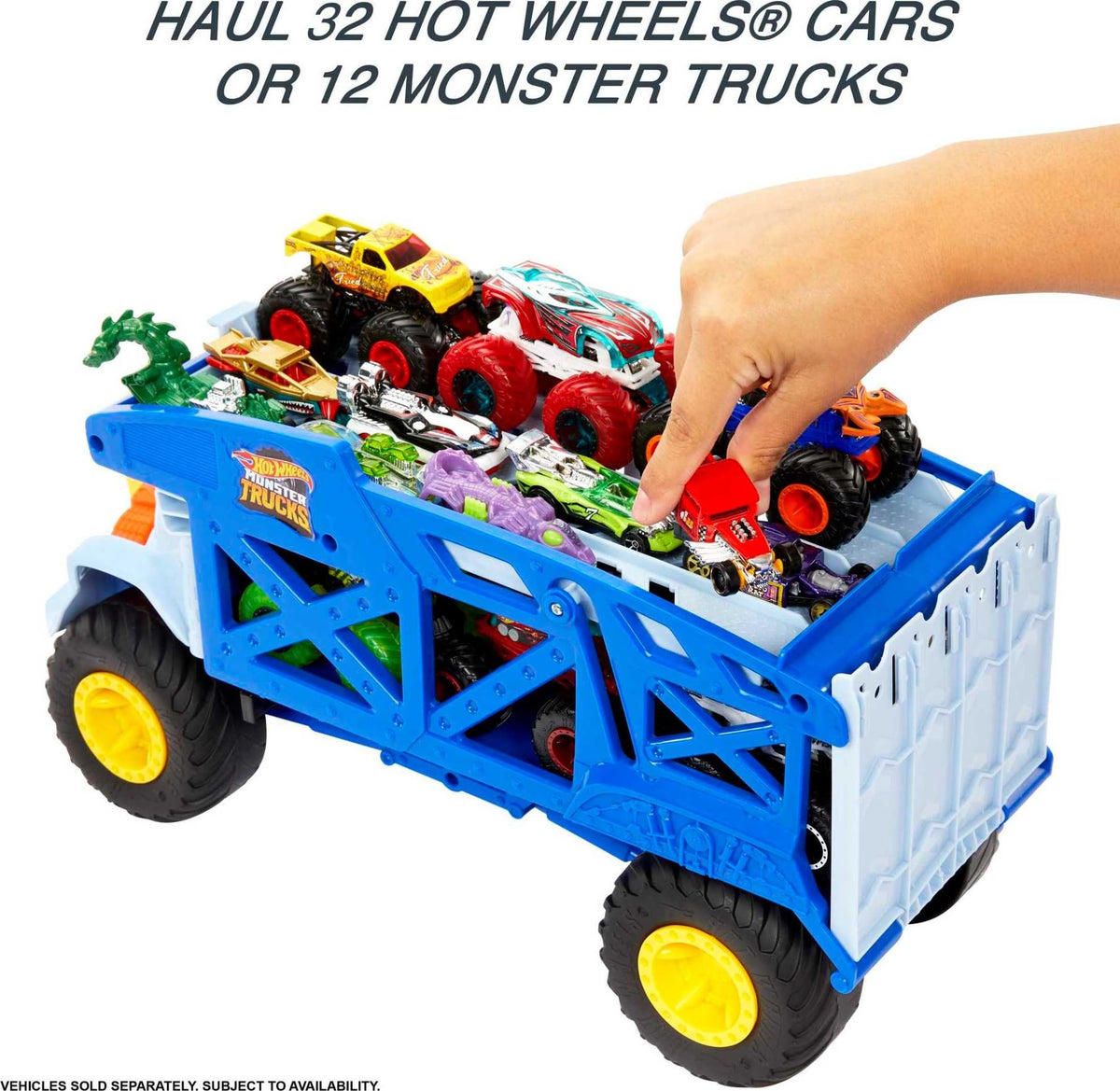 Two-level storage on Hot Wheels Monster Mover keeps a 1:64 fleet organized.