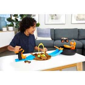 Hot Wheels Stunt Tire Playset closed with handle for easy portability.