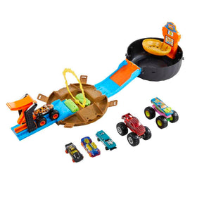 Hot Wheels Monster Trucks Stunt Tire Playset opened with action-ready trucks, ideal for on-the-go play.