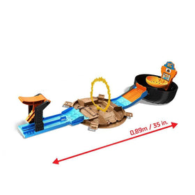 Hot Wheels winner's circle and scoreboard give instant stunt feedback.
