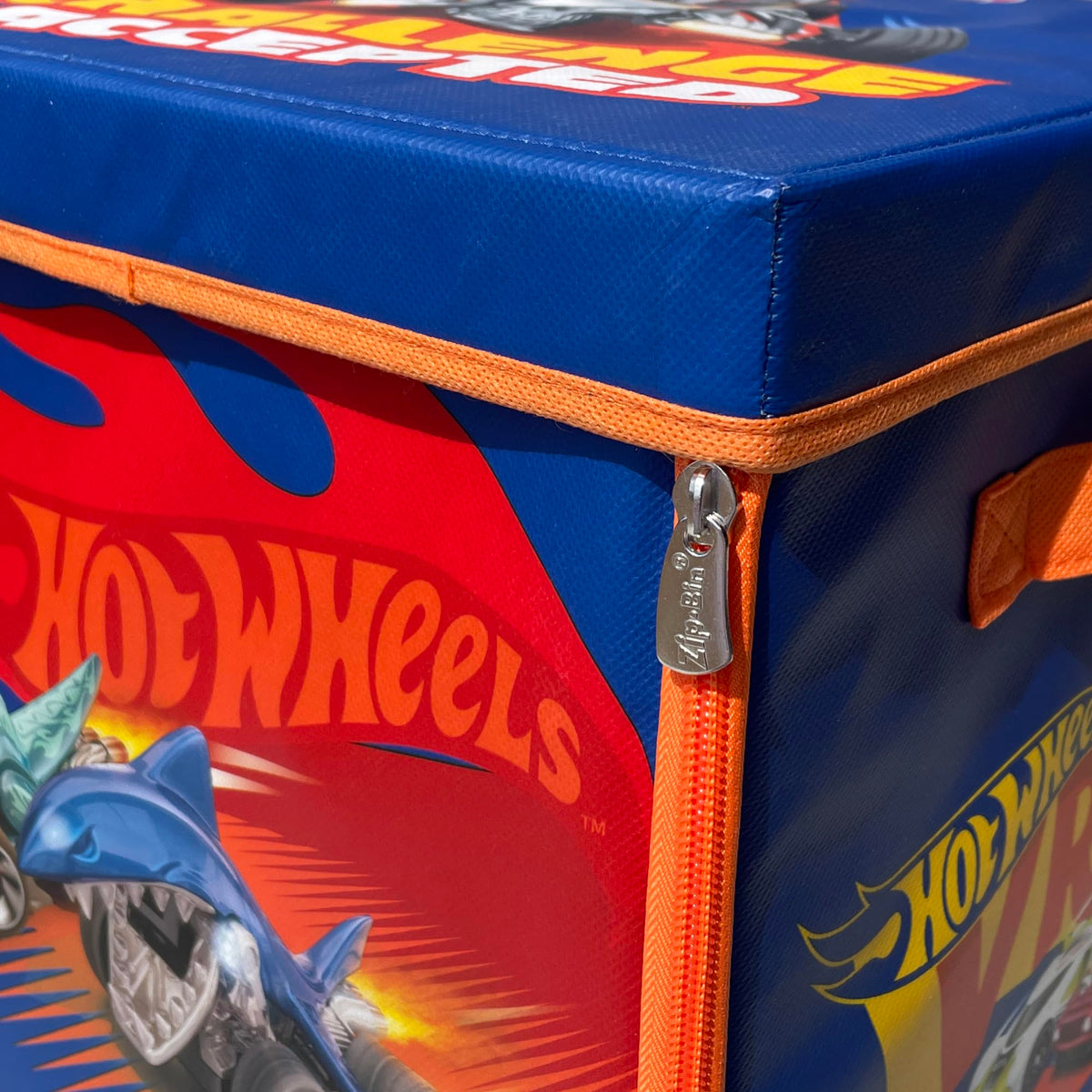 Hot Wheels ZipBin offers space-saving storage that doubles as a play surface.