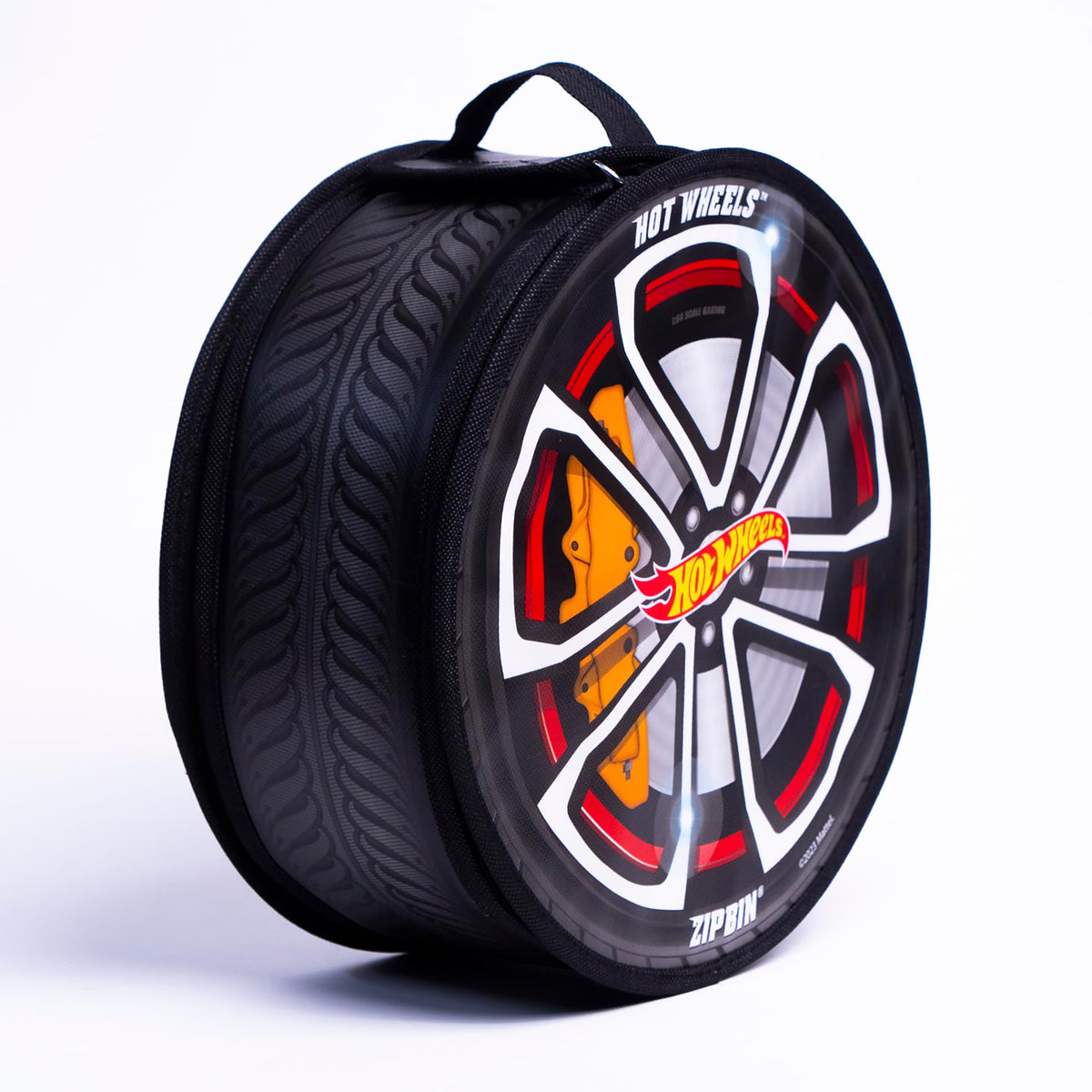 Hot Wheels ZipBin Wheelie opens into a compact racetrack for instant play.