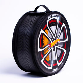 Hot Wheels ZipBin Wheelie opens into a compact racetrack for instant play.
