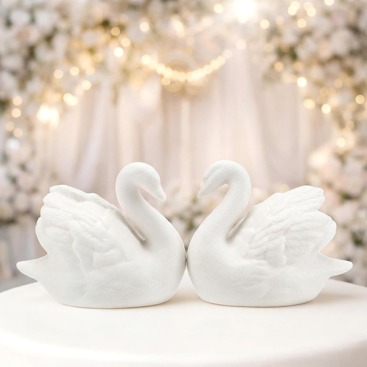 Vintage elegant Swan topper complements classic and modern themes