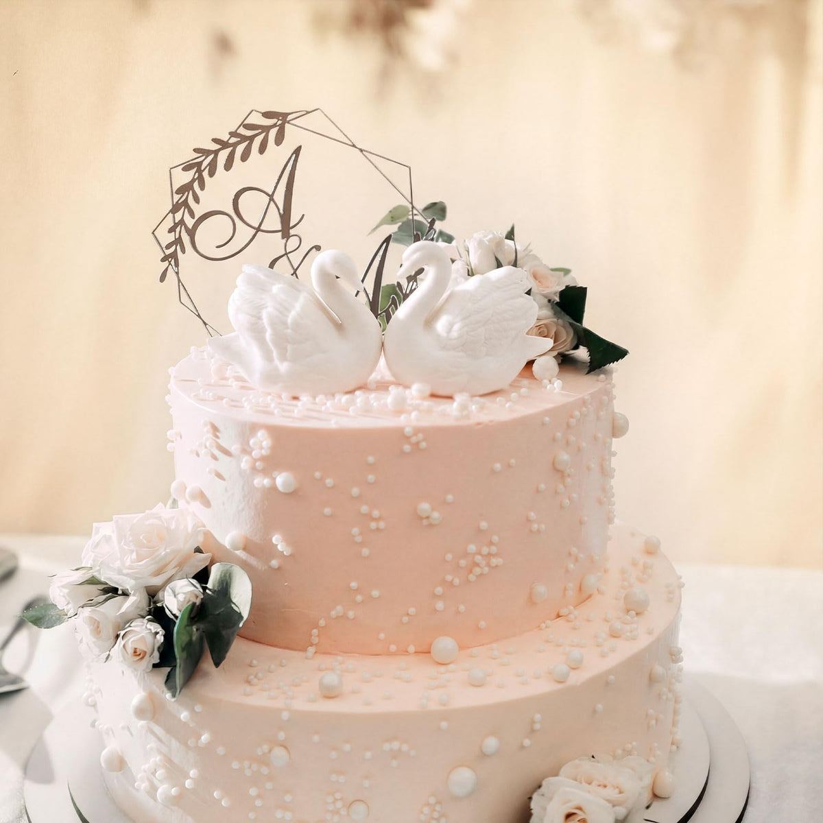 Ceramic wedding topper with cake nail included for secure setup