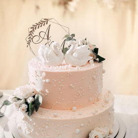 Ceramic wedding topper with cake nail included for secure setup