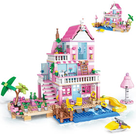 HSANHE Pink Girls Seaside Villa assembly shows a bright pink facade for imaginative play.
