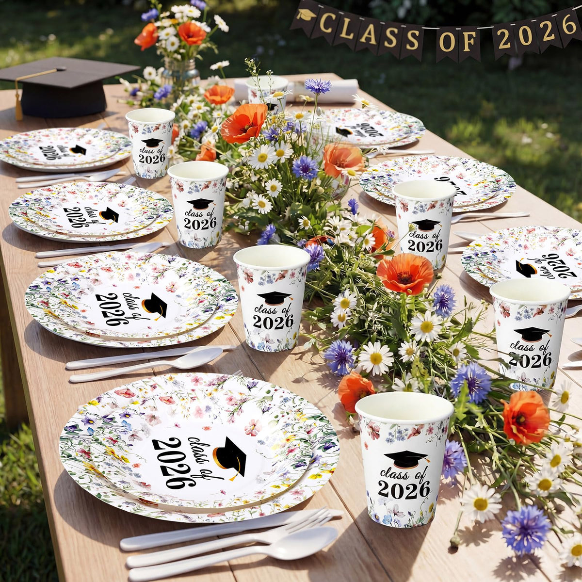 Close up of Hsei wildflower graduation design detail with blossoms and graduation backdrop