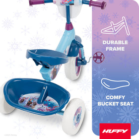Built-in storage compartments on the Huffy Frozen 2 trike hold snacks and toys.