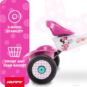 Huffy Minnie Mouse trike handlebar bow highlights playful design and grip.