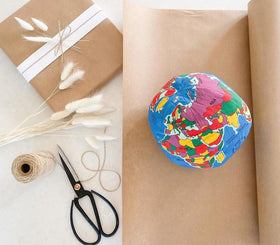 Hugg-A-Planet Classic Political Earth packaging emphasizes gift-ready presentation.