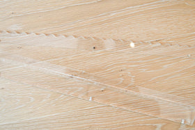 Elegant scallop silhouette enhances table presence during play.