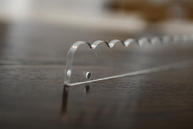 Rack set compatible with standard tiles and larger variants up to 1.5 inches.