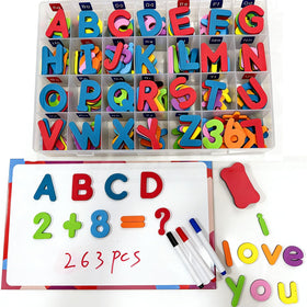 Hummigoo magnets on fridge showing full 263-piece set for spelling and counting.