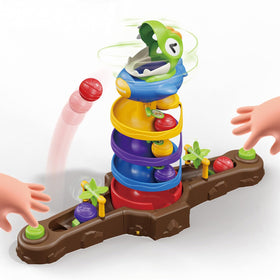 Humzo dinosaur ball drop toy in Montessori play setup supporting coordination